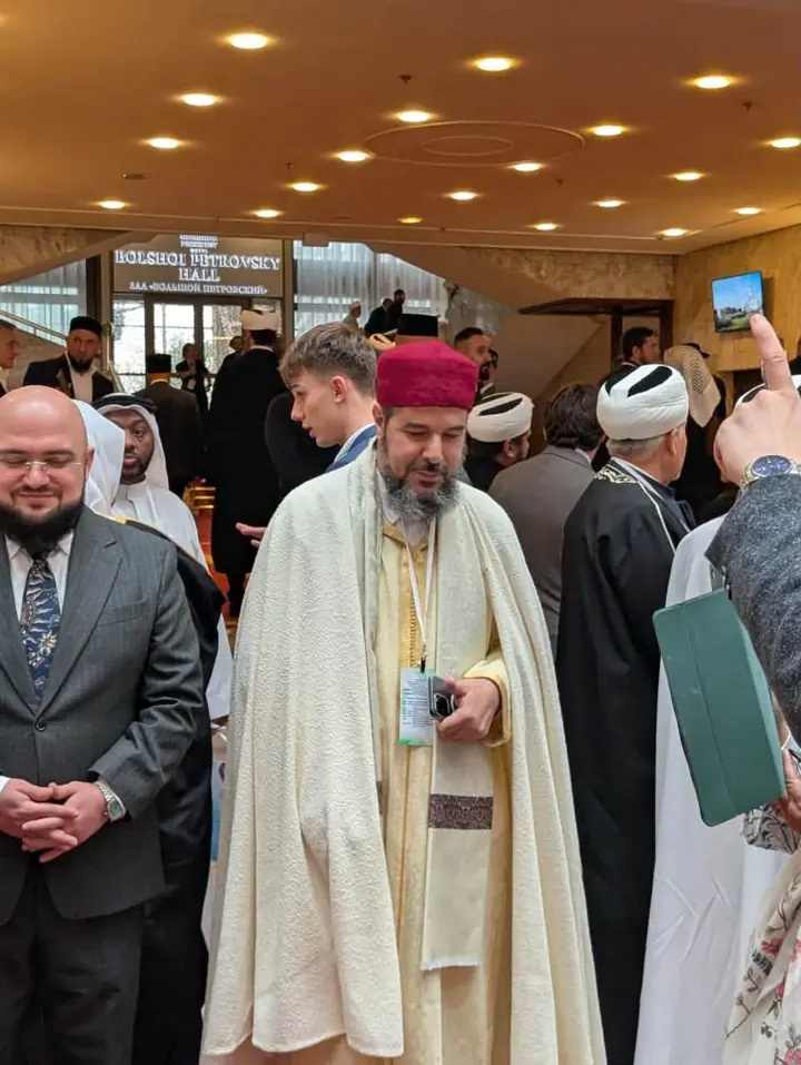 The Sheikh in the conference lobby